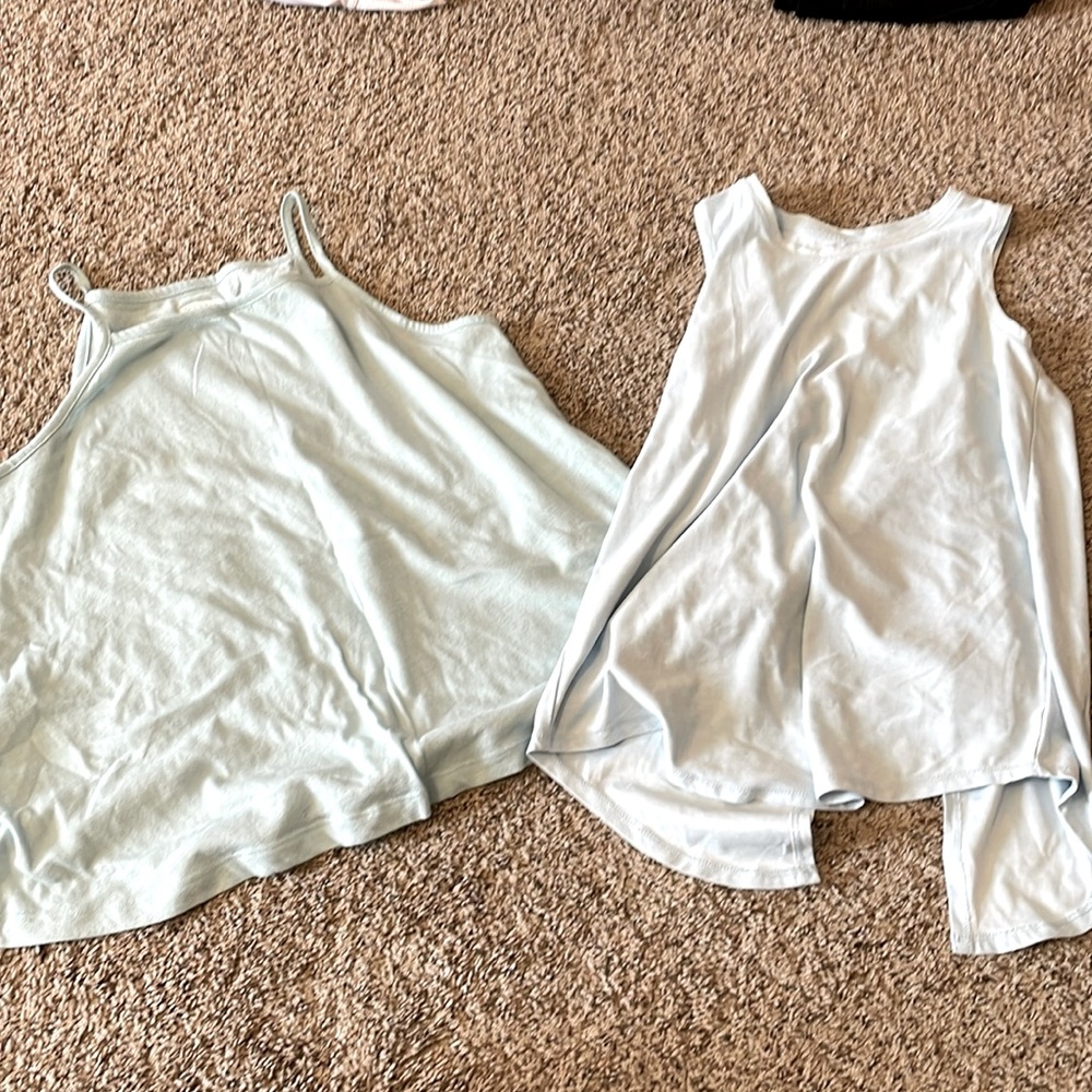 two washed blue tank tops